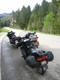 Two BMW motorcycles, parked for the evening