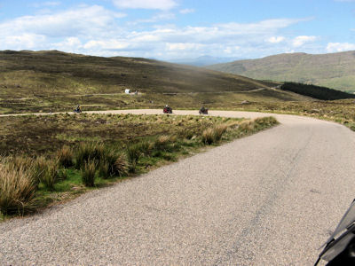 Sweeping Curve on a Country Road in the Scottish Highlands