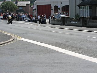 Trying to capture one of the bikes during the race in Ramsey