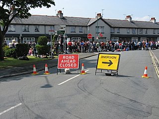 Street signs blocking off the race course in Ramsey