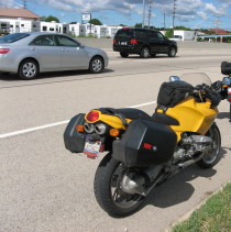 My rather uncomfortable seat, taking a break on a busy highway.  