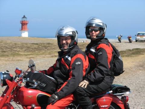 Regina and husband, on their borrowed Moto Guzzi