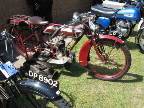 Another beautiful vintage motorcycle at a rally.