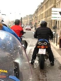 Motorcycles Riding in Rain