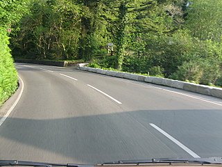 Sunshine, dry roads and an approaching curve.