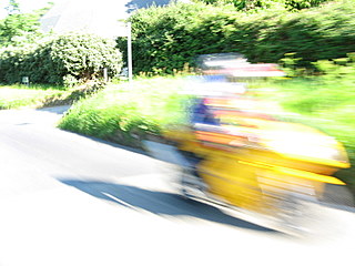 A really speedy bright yellow motorcycle passing me...probably enroute to a ticket.