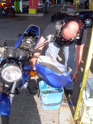Draining Motorcycle Gas Tank in Italy